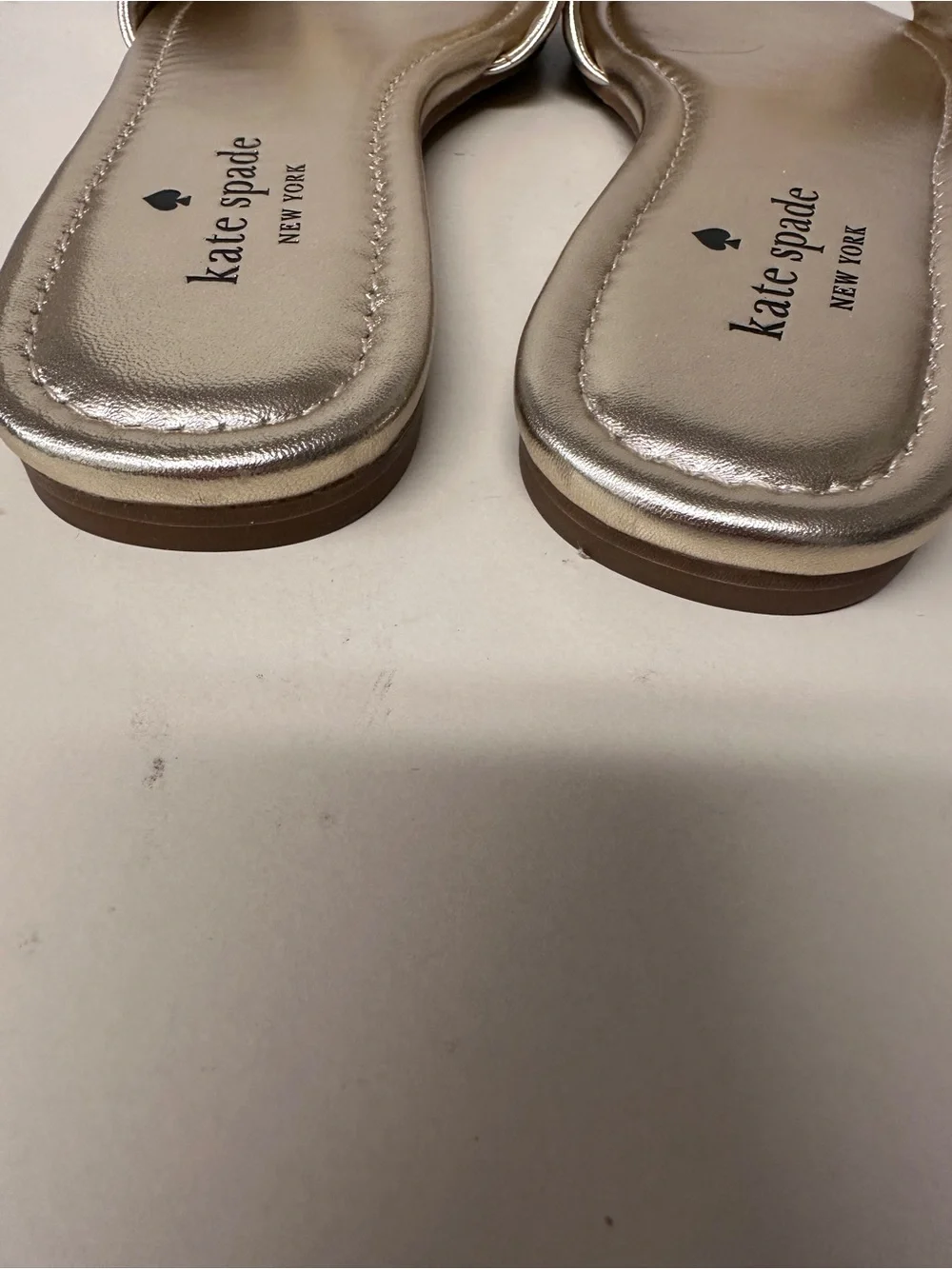 kate spade Metallic Gold Twist Slide Sandals